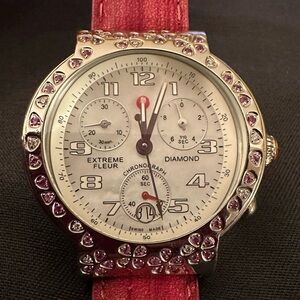 Michele Extreme Fleur watch with diamond and pink sapphire.